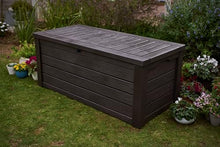 Load image into Gallery viewer, Keter Outdoor Storage Deck Box, 150 Gallon Resin Patio Bin & Bench, Wood Grain, Brown