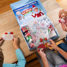 Load image into Gallery viewer, The Elf on the Shelf 24-Day Super Set Official The Elf on the Shelf Ideas for 24 Days of Elf Magic - 80+ Props, MagiFreez Standing Pants and Calendar - for Ages 3 Years and Up Scout Elf Not Included