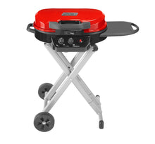 Load image into Gallery viewer, Coleman Roadtrip 225: Portable Propane Grill, Gas Grill with Push-Button Start, Foldable Legs & Wheels, Side Table, and 11k BTUs