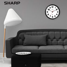 Load image into Gallery viewer, Sharp Atomic Analog Wall Clock - 12" Black Stylish Frame - Sets Automatically- Battery Operated - Easy to Read - Easy to Use – Modern Design and Style
