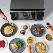 Load image into Gallery viewer, Farberware Countertop Microwave 1100 Watts, 1.6 cu ft - Smart Sensor Microwave Oven With LED Lighting and Child Lock - Perfect for Apartments and Dorms - Easy Clean - Stainless Steel