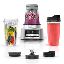Load image into Gallery viewer, Ninja SS101 Foodi Smoothie Maker & Nutrient Extractor* 1200 WP, 6 Functions Smoothies, Extractions*, Spreads, smartTORQUE, 14-oz. , (2) To-Go Cups & Lids, Silver