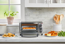 Load image into Gallery viewer, BLACK+DECKER 4-Slice Toaster Oven, Even Toast, 4 Cooking Functions Bake, Broil, Toast and Keep Warm, Removable Crumb Tray, Timer