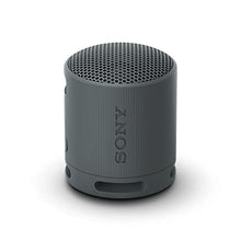 Load image into Gallery viewer, Sony SRS-XB100 Wireless Bluetooth Portable Lightweight Super-Compact Travel Speaker, Extra-Durable IP67 Waterproof & Dustproof, 16 Hour Battery, Versatile Strap, and Hands-Free Calling, Black New