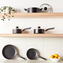 Load image into Gallery viewer, Amazon Basics Non-Stick Cookware 8-Piece Set, Pots and Pans, Black