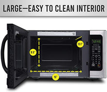 Load image into Gallery viewer, Farberware Countertop Microwave 1100 Watts, 1.2 cu ft - Smart Sensor Microwave Oven With LED Lighting and Child Lock - Perfect for Apartments and Dorms - Easy Clean Black Interior, Stainless Steel
