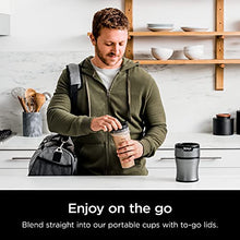 Load image into Gallery viewer, Ninja BN301 Nutri-Blender Plus Compact Personal Blender, 900-Peak-Watt Motor, Frozen Drinks, Smoothies, Sauces & More, (3) 20 oz. To-Go Cups, (2) Spout-Lids (1) Storage-Lid, Dishwasher Safe, Silver