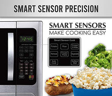 Load image into Gallery viewer, Farberware Countertop Microwave 1100 Watts, 1.2 cu ft - Smart Sensor Microwave Oven With LED Lighting and Child Lock - Perfect for Apartments and Dorms - Easy Clean Black Interior, Stainless Steel