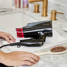 Load image into Gallery viewer, Panasonic nanoe Compact Hair Dryer for Healthy-Looking Hair, 1400W Portable Hair Dryer with Folding Handling and QuickDry Nozzle for Fast Drying – EH-NA27-K (Black/Pink)