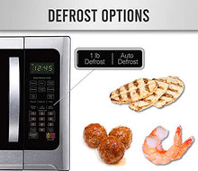 Load image into Gallery viewer, Farberware Countertop Microwave 1100 Watts, 1.2 cu ft - Smart Sensor Microwave Oven With LED Lighting and Child Lock - Perfect for Apartments and Dorms - Easy Clean Black Interior, Stainless Steel