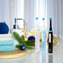 Load image into Gallery viewer, Oral-B iO Series 3 Limited Rechargeable Electric Powered Toothbrush, Black with 2 Brush Heads and Travel Case - Visible Pressure Sensor to Protect Gums - 3 Modes - 2 Minute Timer