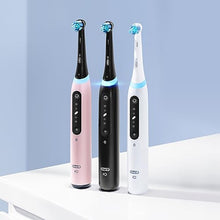 Load image into Gallery viewer, Oral-B iO Series 5 Rechargeable Electric Toothbrush with Visible Pressure Sensor to Protect Gums, 2 Minute Timer, 5 Cleaning Settings, 1 Replacement Toothbrush Heads, and Travel Case, Black
