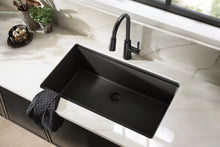 Load image into Gallery viewer, Moen Riley Matte Black One-Handle Pulldown Kitchen Faucet Featuring Power Boost for a Faster Clean and Reflex Docking System for The Spray Head, Modern Kitchen Sink Faucet, 7402BL
