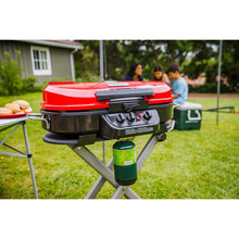 Load image into Gallery viewer, Coleman Roadtrip 285 Portable Stand-Up Propane Grill, Gas Grill with 3 Adjustable Burners and Instastart Push-Button Ignition; Grease Tray, Side Tables, Thermometer, Folding Legs &amp; Wheels Included
