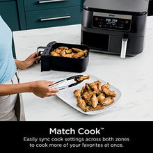 Load image into Gallery viewer, Ninja DZ090 Foodi 6 Quart 5-in-1 DualZone 2-Basket Air Fryer with 2 Independent Frying Baskets, Match Cook &amp; Smart Finish to Roast, Bake, Dehydrate &amp; More for Quick Snacks &amp; Small Meals, Black
